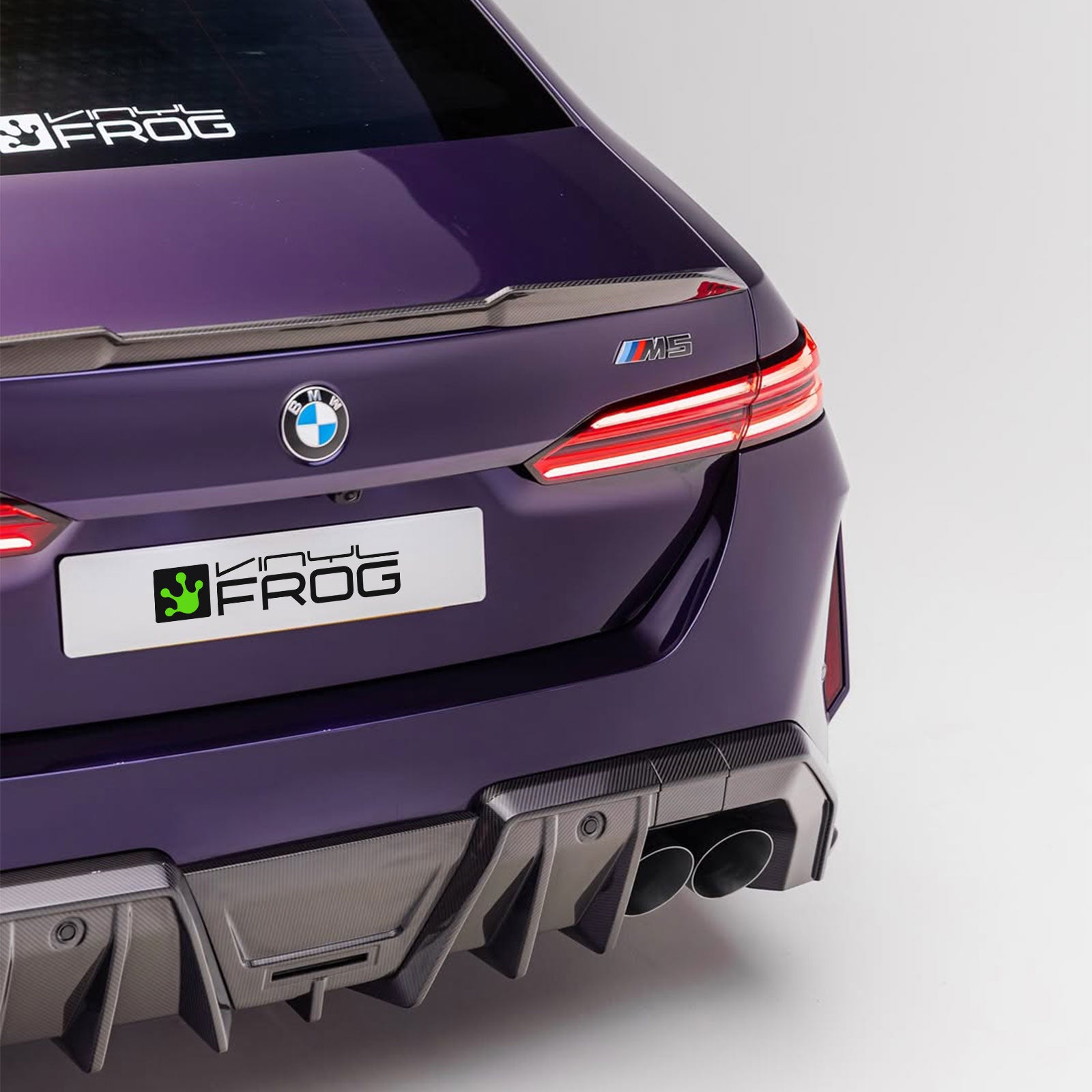 BMW M5 wrapped in Glossy Metallic Midnight Purple Color PPF back light.