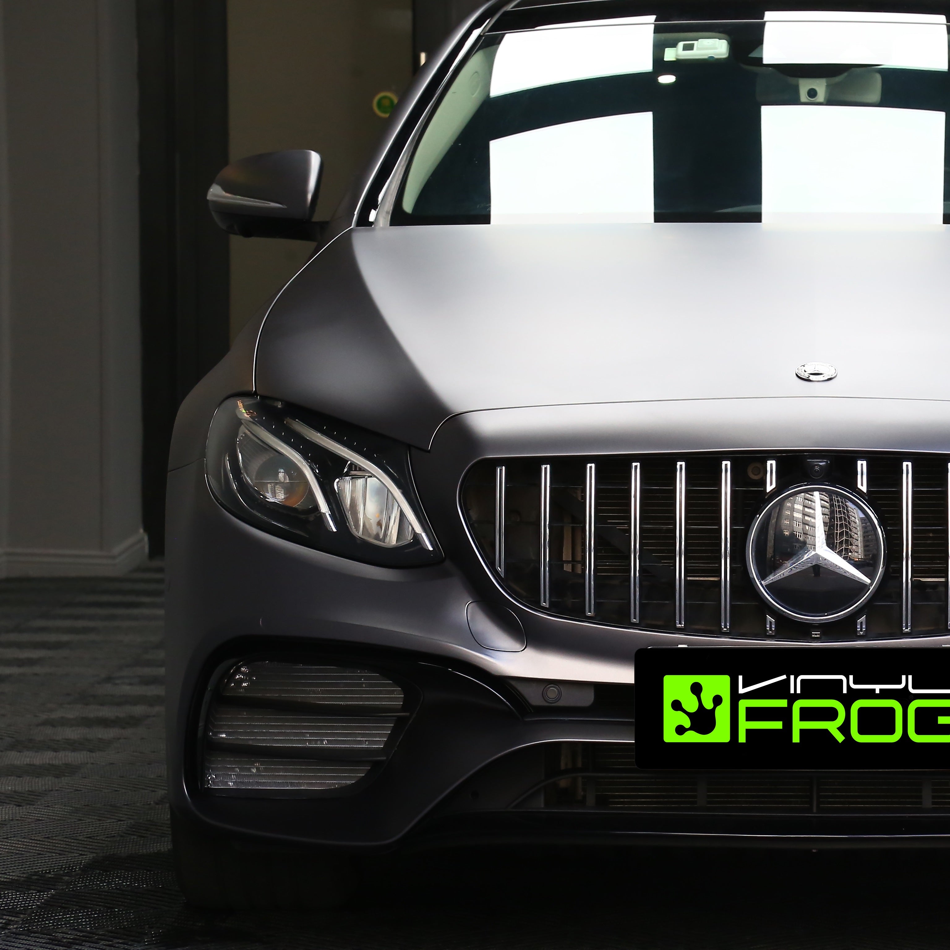 Front view of a Mercedes in Matte Metallic Gray vinyl wrap