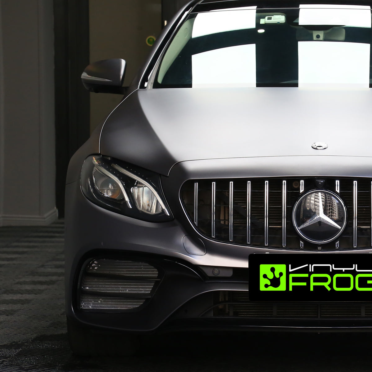 Front view of a Mercedes in Matte Metallic Gray vinyl wrap