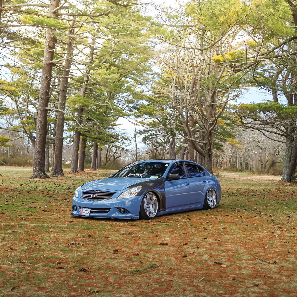 Sedan wrapped in Super Glossy China Blue Vinyl Wrap