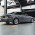 Audi A5 wrapped in Super Glossy Nardo Gray vinyl wrap in garage.