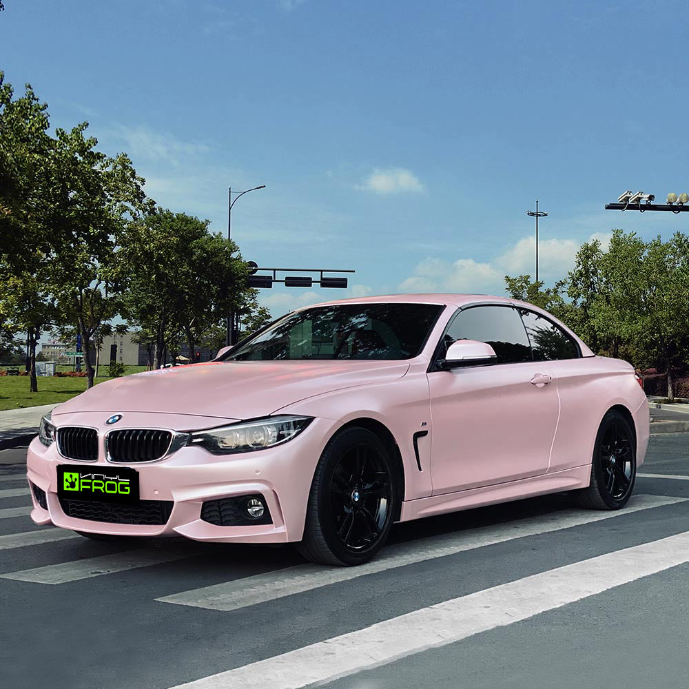 BMW 4 Series wrapped in Matte Metallic Pearl Baby Pink vinyl wrap.