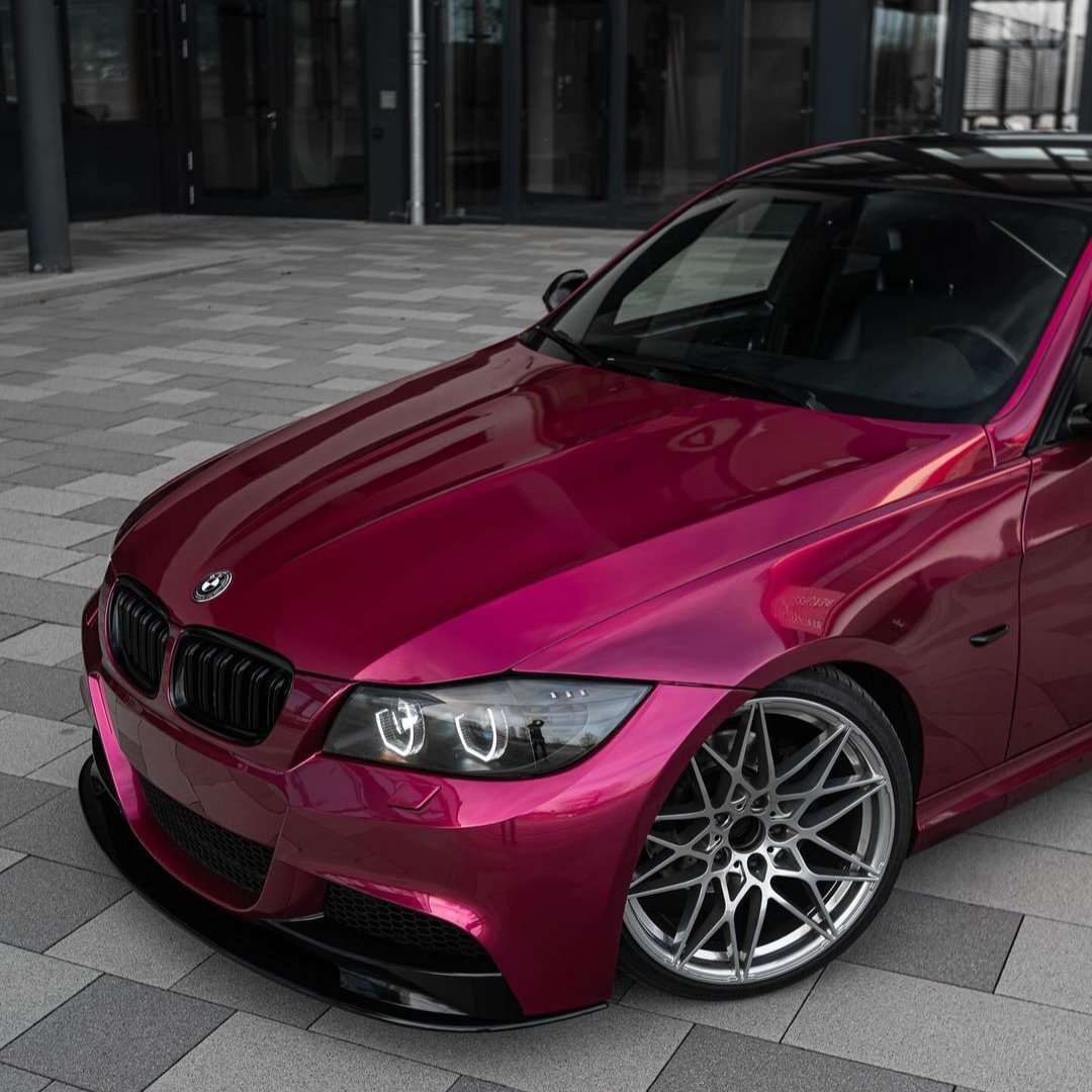 BMW wrapped in Glossy Metallic Rubellite Purple vinyl wrap.