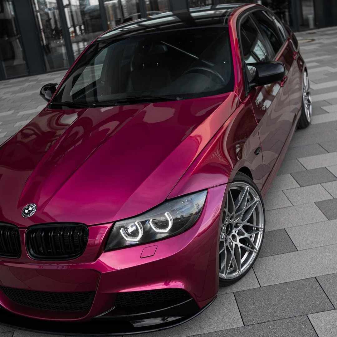 BMW wrapped in Glossy Metallic Rubellite Purple vinyl wrap side view