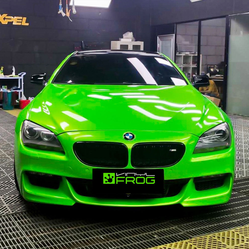 BMW wrapped in Candy Metallic Neon Green vinyl wrap.