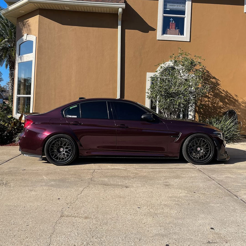 BMW wrapped in Glossy Metallic Plum Purple vinyl wrap side view