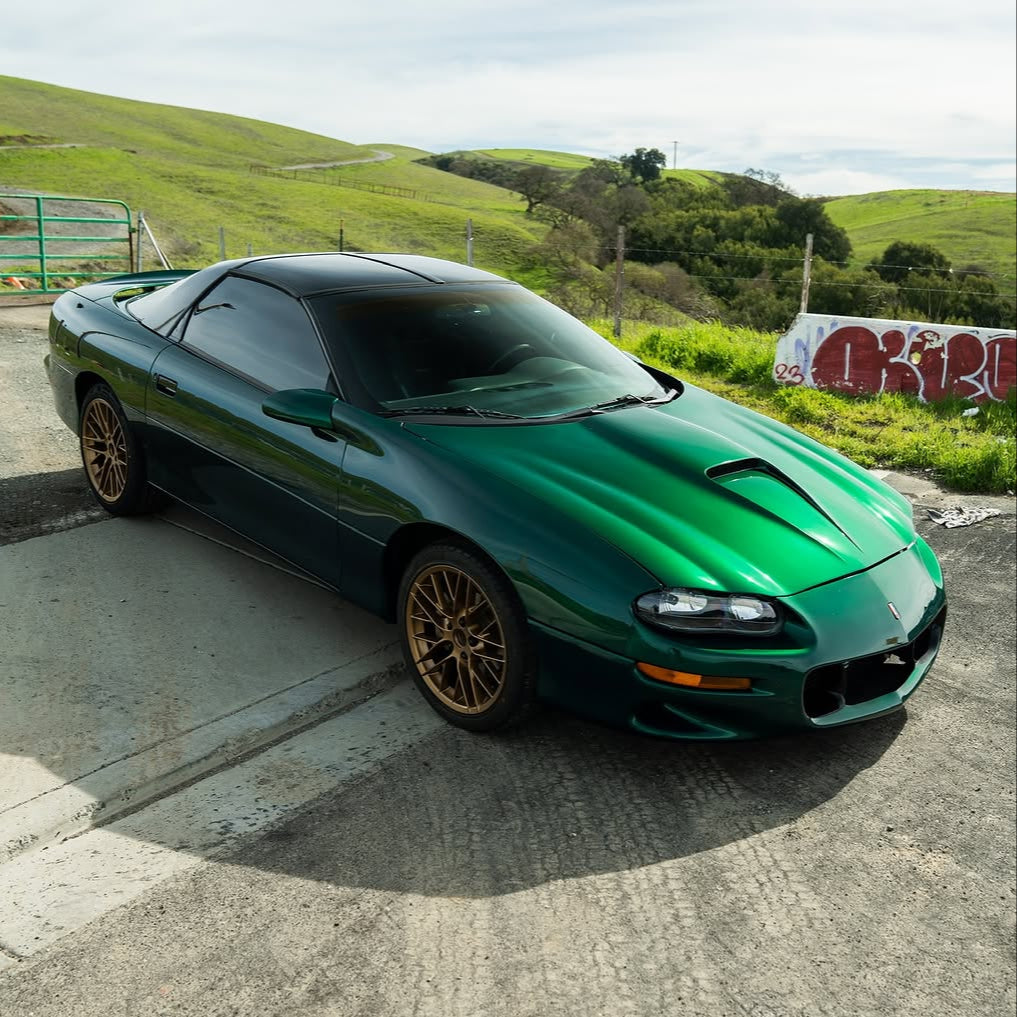 Chevrolet Camaro wrapped in Glossy Metallic La Salle Green vinyl wrap.