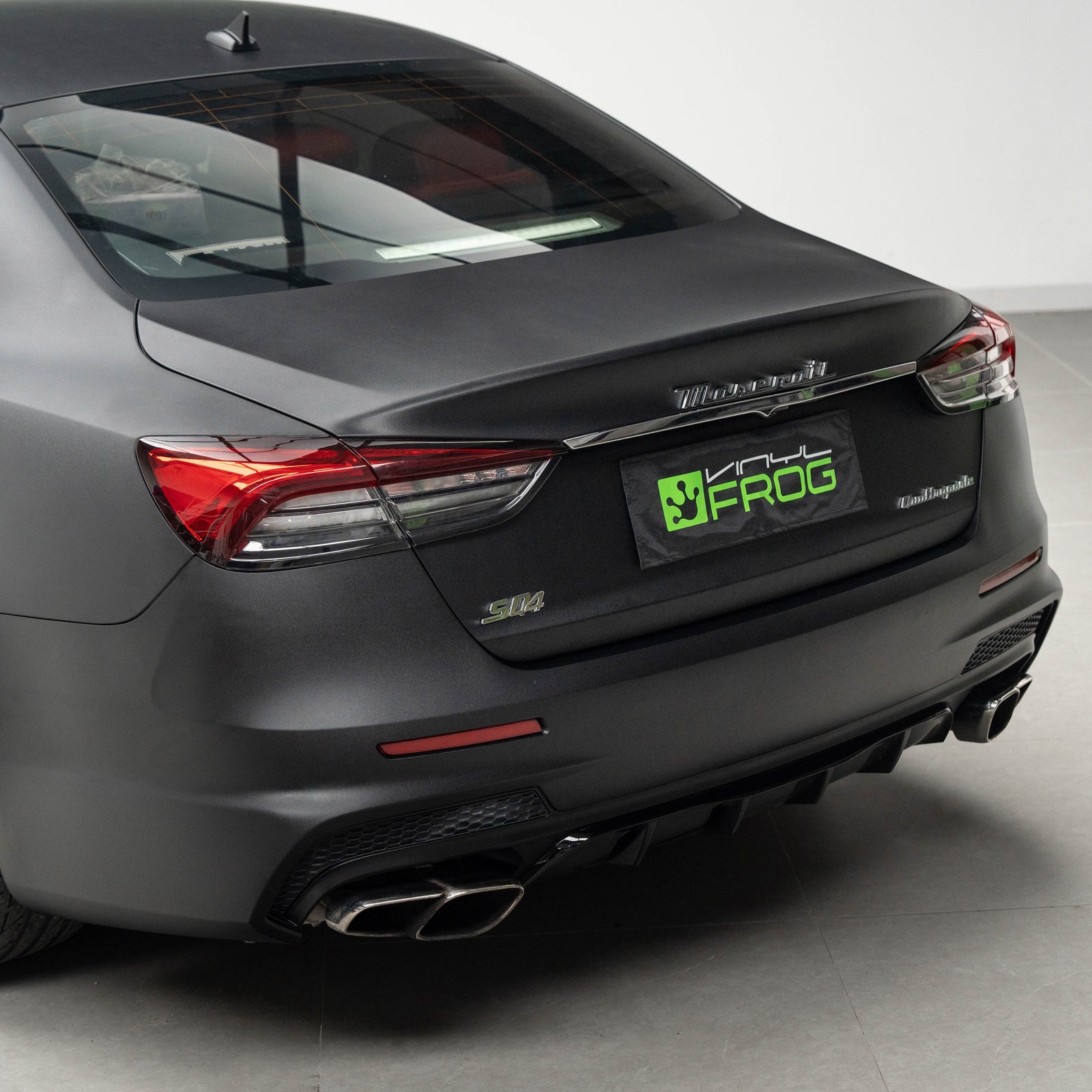 Maserati Quattroporte wrapped in Satin Black Vinyl Wrap back side 