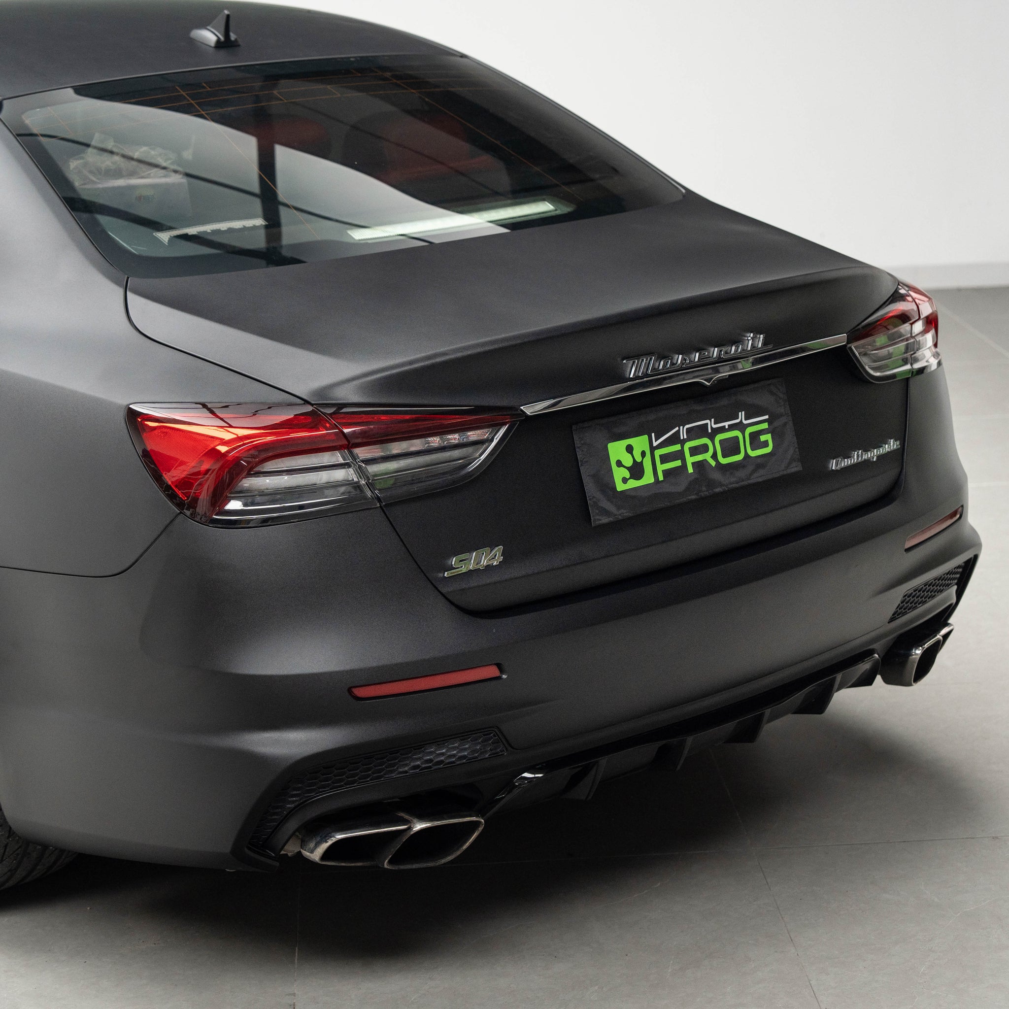 Maserati Quattroporte wrapped in Satin Black Vinyl Wrap back side 