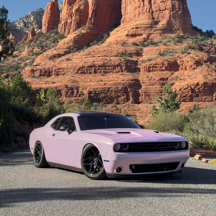 Dodge Challenger wrapped in Candy Metallic Pink White vinyl wrap.