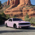 Dodge Challenger wrapped in Candy Metallic Pink White vinyl wrap.