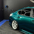 Deep Sea Green Subaru Rear Quarter