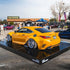 Lexus wrapped in Glossy Metallic Golden Yellow vinyl wrap back view.