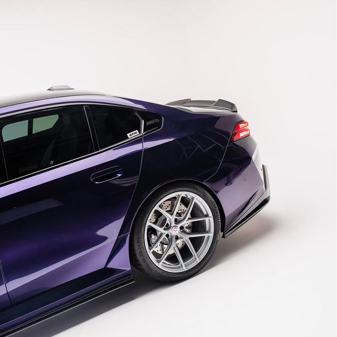 BMW M5 wrapped in Glossy Metallic Midnight Purple Color PPF tyre