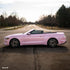 Ford Mustang Convertible wrapped in High Glossy Baby Pink vinyl wrap side view.