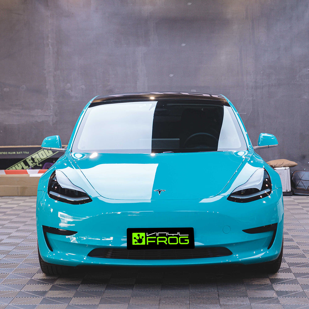 High Glossy Miami Blue car wrap.