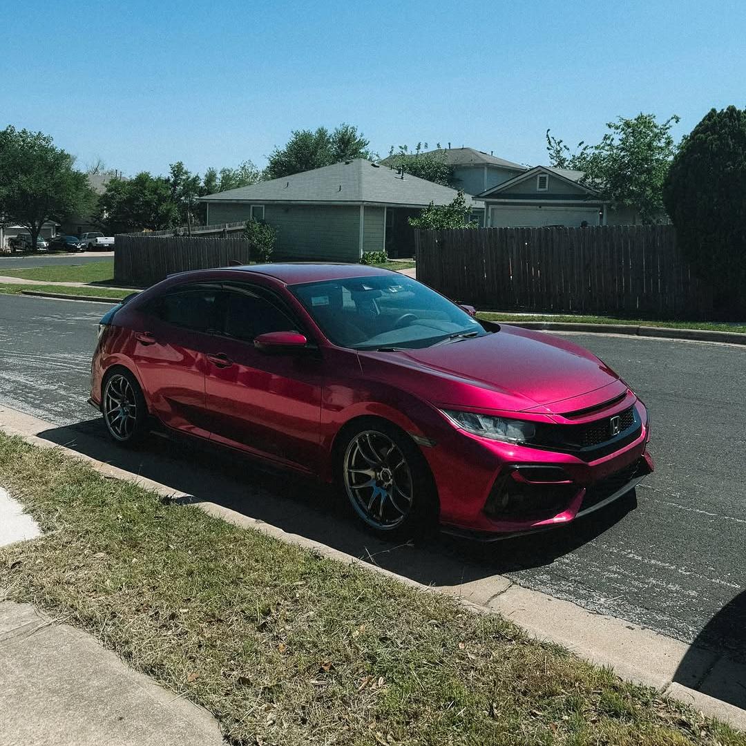 Honda Civic wrapped in Glossy Metallic Rubellite Purple vinyl wrap.