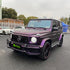 Mercedes-Benz G-Class wrapped in Matte Russian Violet Vinyl Wrap on road.