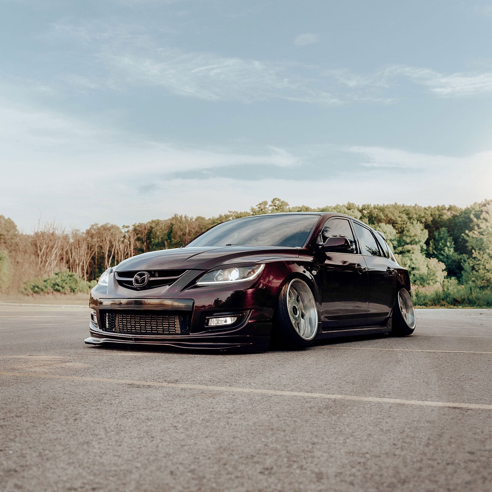 Mazda 3 Front View in Glossy Metallic Black Rose Color PPF