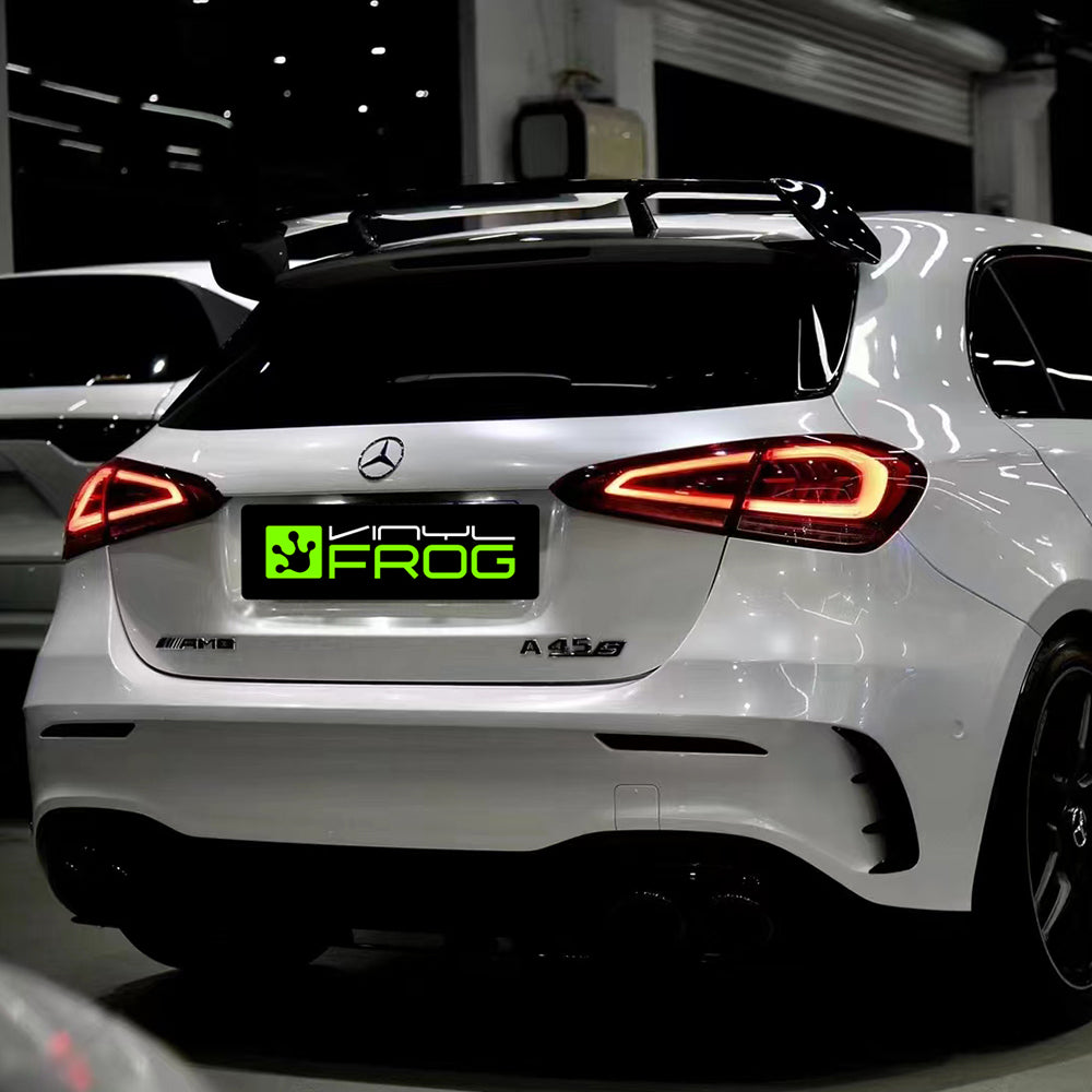 Mercedes-Benz CLA-Class wrapped in Glossy Pearl White vinyl wrap back view.