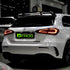 Mercedes-Benz CLA-Class wrapped in Glossy Pearl White vinyl wrap back view.