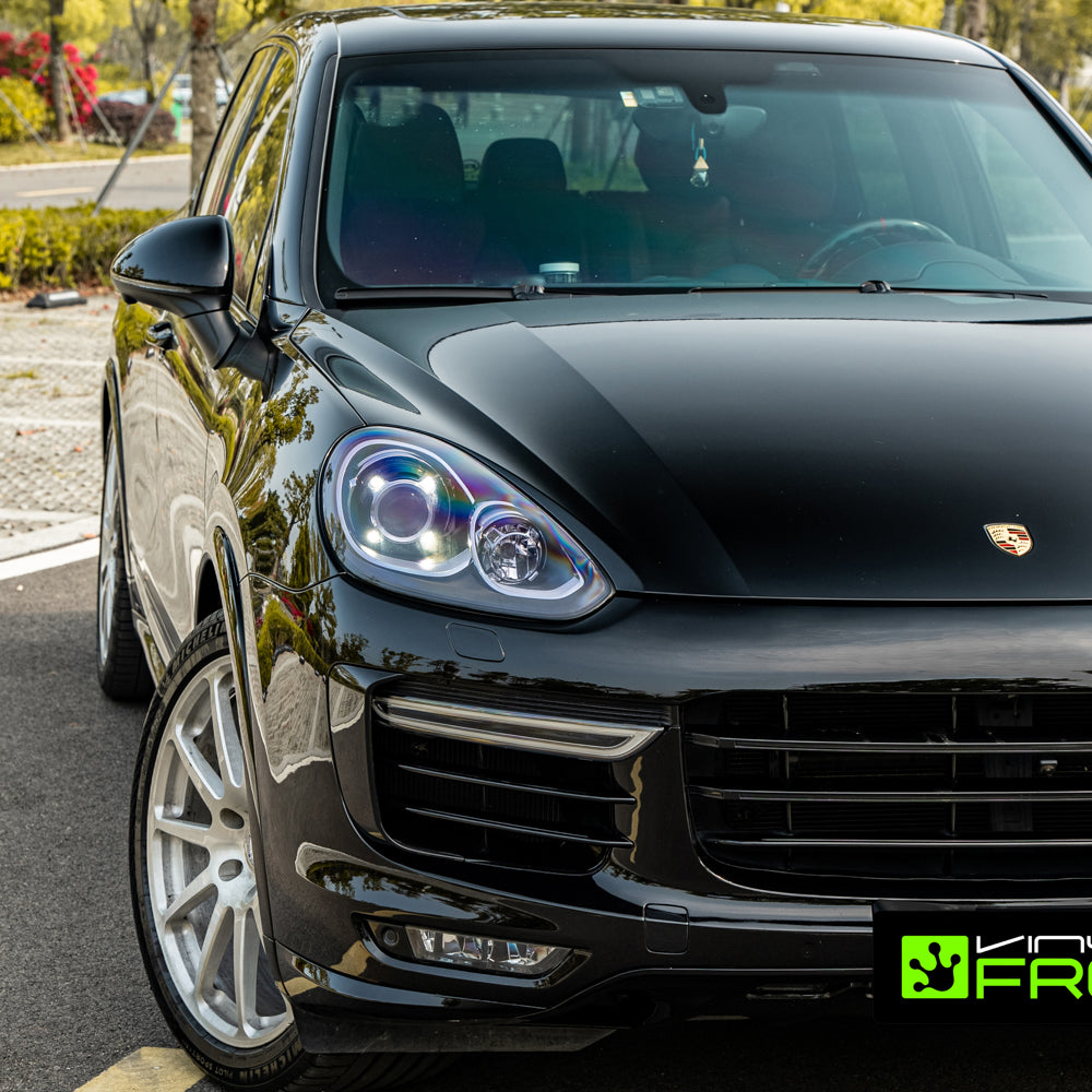 Porsche Cayenne wrapped in High Glossy Paint Black vinyl wrap.