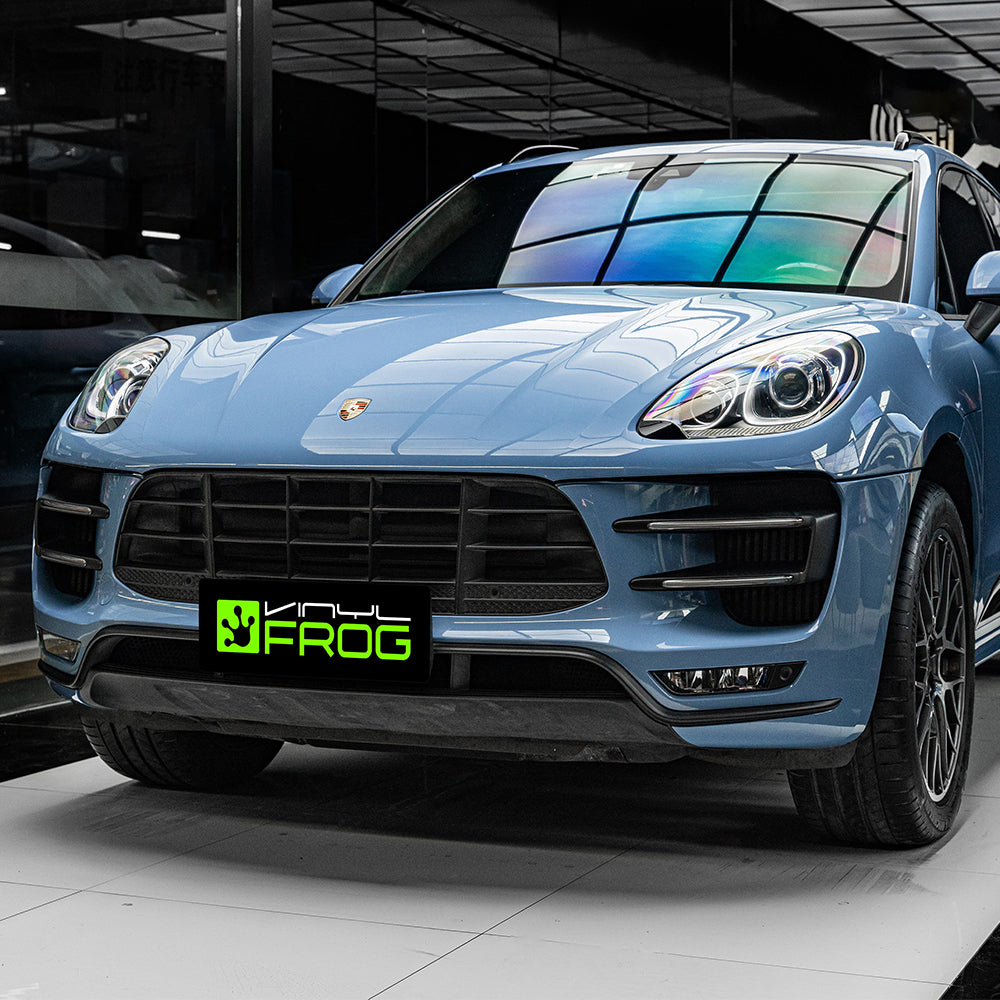 Porsche Macan wrapped in Super Glossy China Blue vinyl wrap.