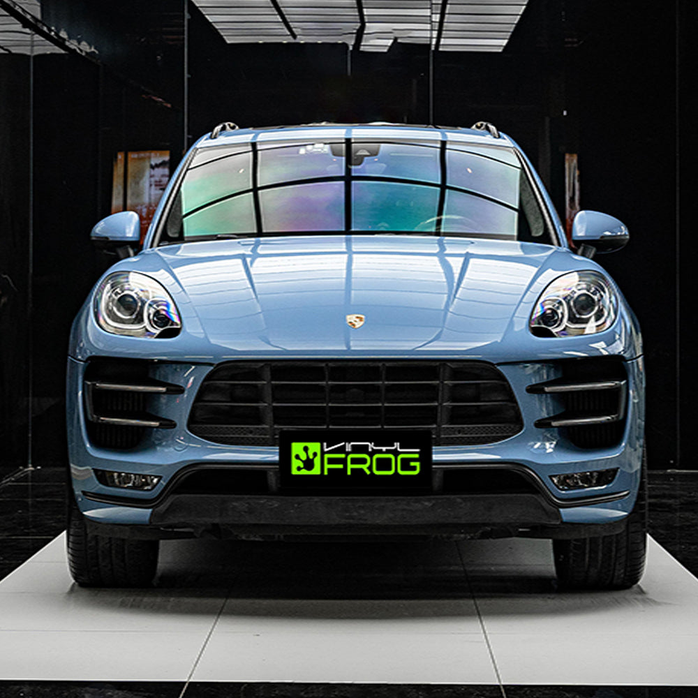 Porsche Macan wrapped in Super Glossy China Blue vinyl wrap front view