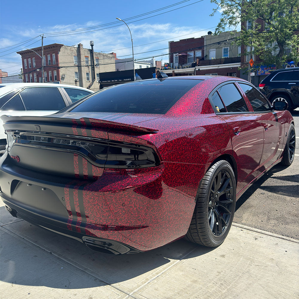 Dodge Charger full body wrapped with Red Forged Carbon Fiber Vinyl Wrap.