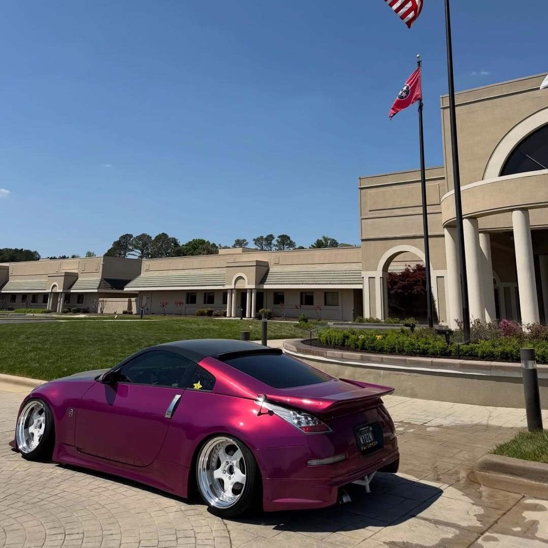 Glossy Metallic Rich Maroon Vinyl Wrap in Sunlight