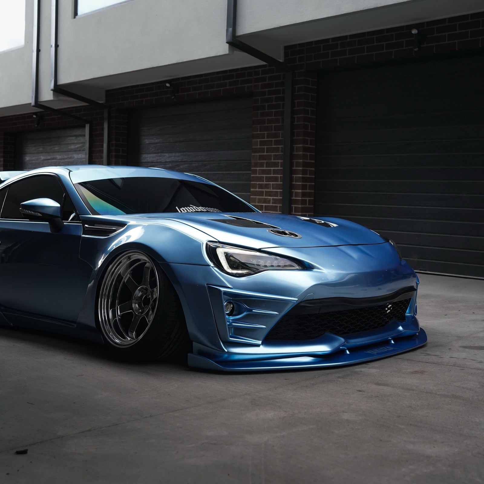 Glossy Metallic Silver Lake Blue Vinyl Wrap