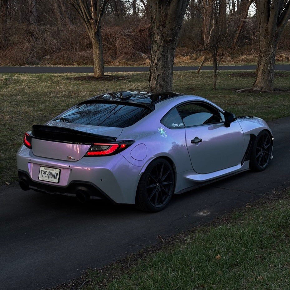 Toyota sports car with a color shifting opal vinyl wrap