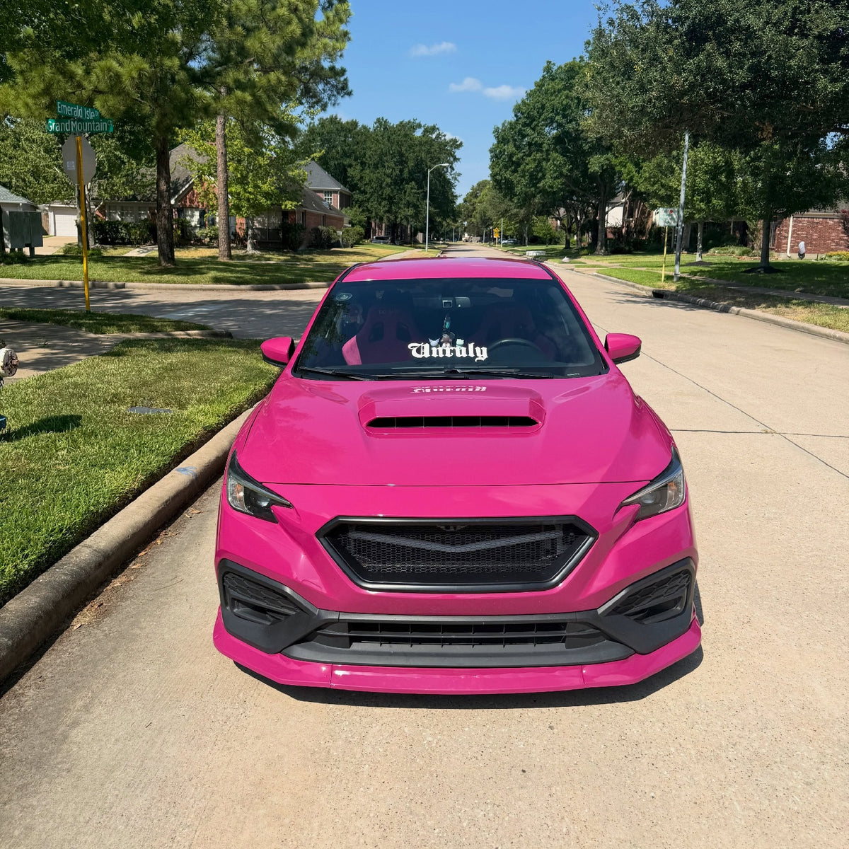 Front View of Subaru in High Glossy Ruby Star Vinyl Wrap