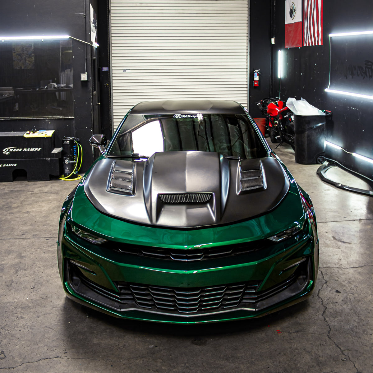 Front view of a Chevrolet in Glossy Metallic La Salle Green Vinyl wrap