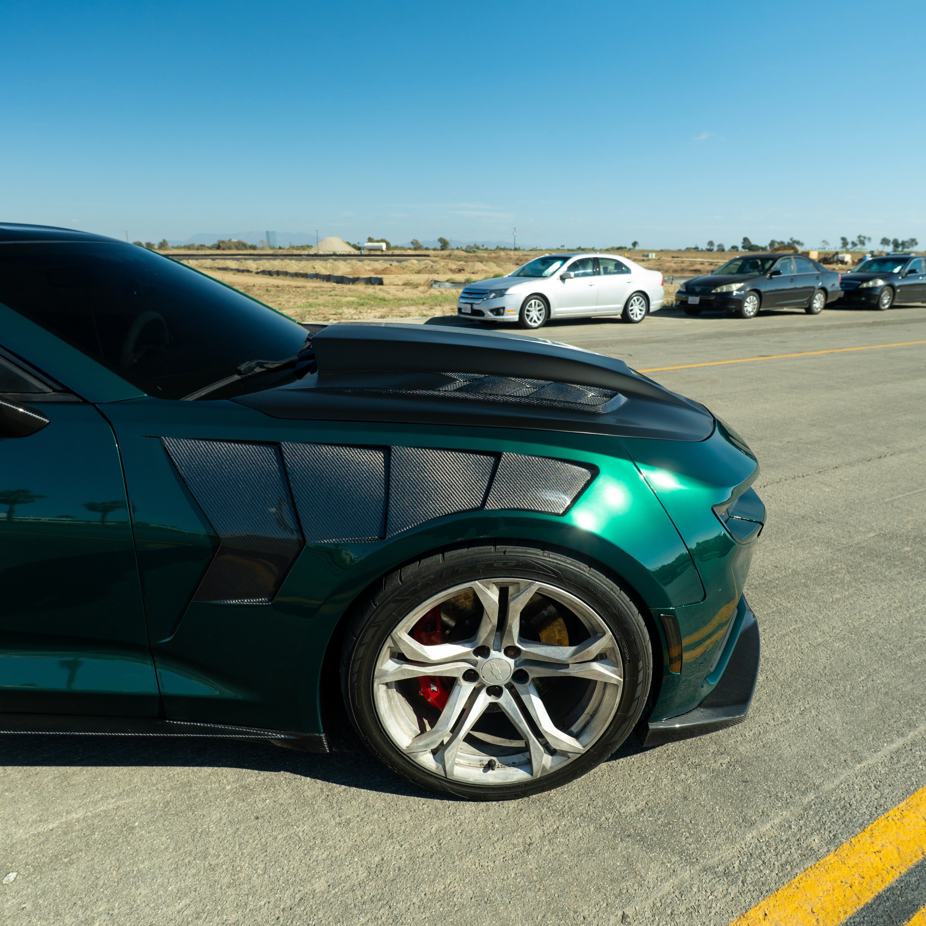 Glossy Metallic La Salle Green Vinyl Wrap with pale mint highlight.