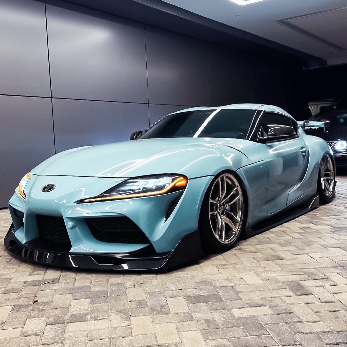 Super Glossy Yacht Blue Vinyl Wrap on supra with front view 