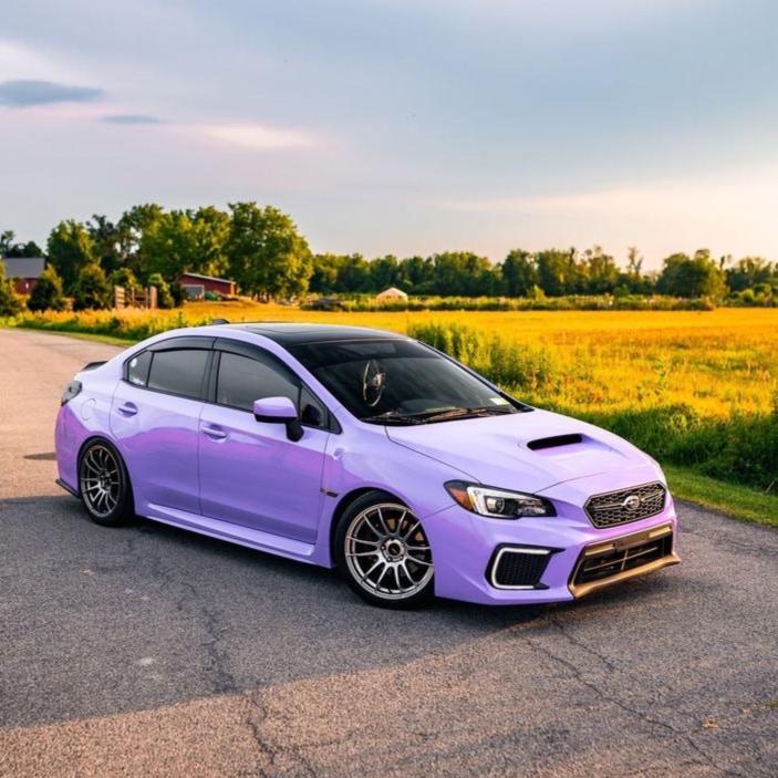 Subaru WRX wrapped in Super Glossy Lavender Purple vinyl wrap.