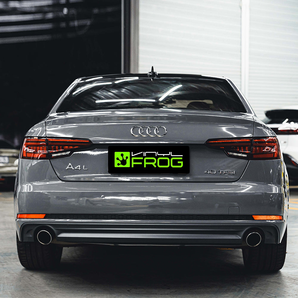 Audi A5 wrapped in Super Glossy Nardo Gray vinyl wrap back view.