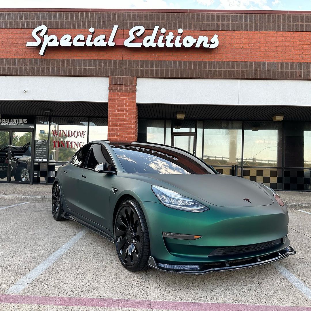 Tesla Model 3 wrapped in Satin Chrome Silk Green vinyl wrap.