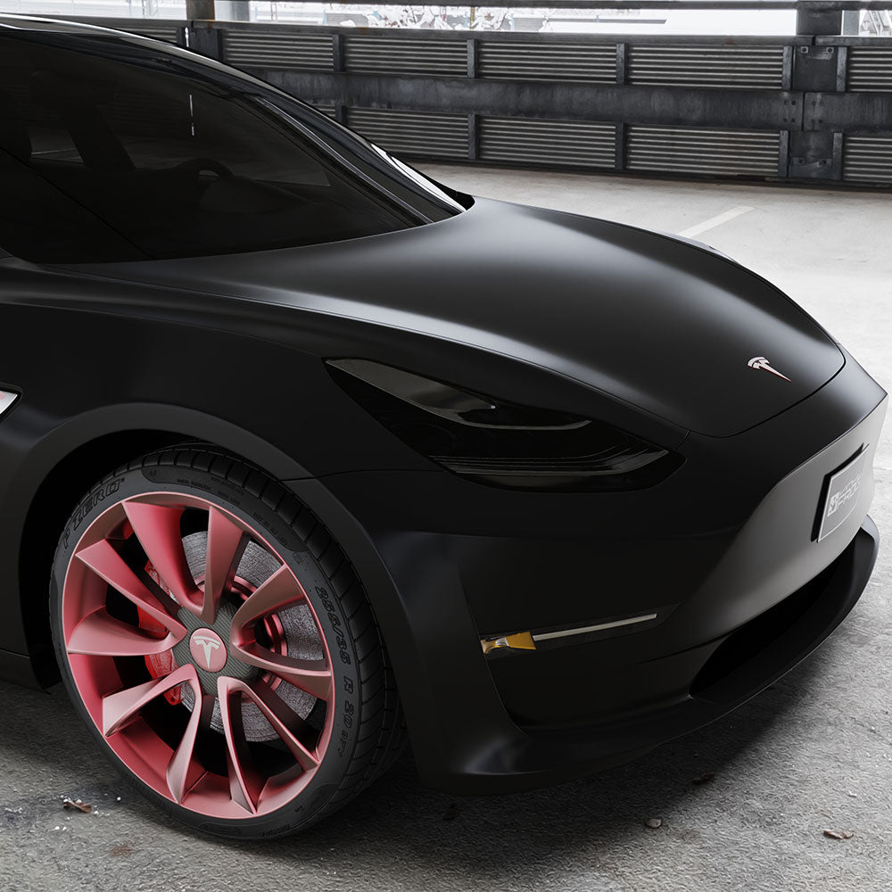 Tesla Model 3 wrapped in Matte Silk Black Vinyl Wrap.
