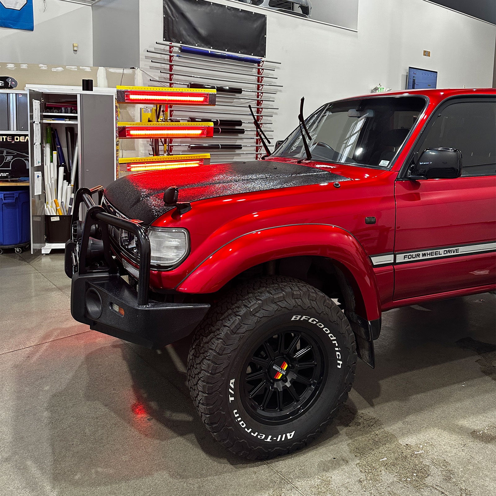Toyota Land Cruiser 80 Series Front Detail in Glossy Metallic Vampire Red Color PPF