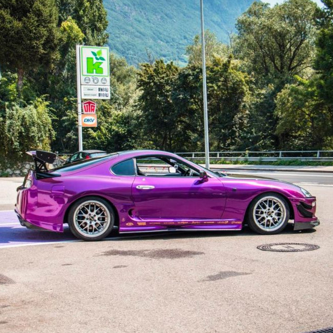Toyota Supra wrapped in Glossy Metallic Grape Purple vinyl wrap