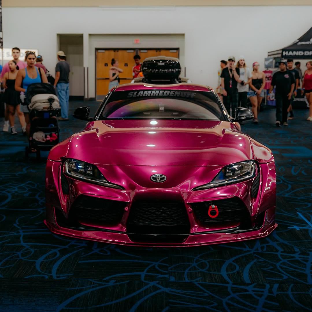 Toyota Supra wrapped in Glossy Metallic Rubellite Purple vinyl wrap.