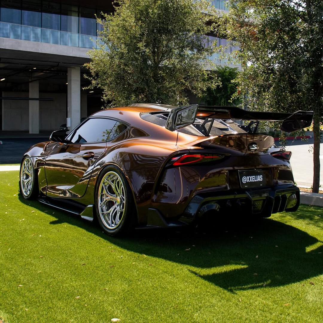 Toyota Supra wrapped in Glossy Metallic Mocha Brown vinyl wrap.