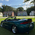 Back view of Mitsubishi Glossy Metallic Deep Sea Green Vinyl Wrap