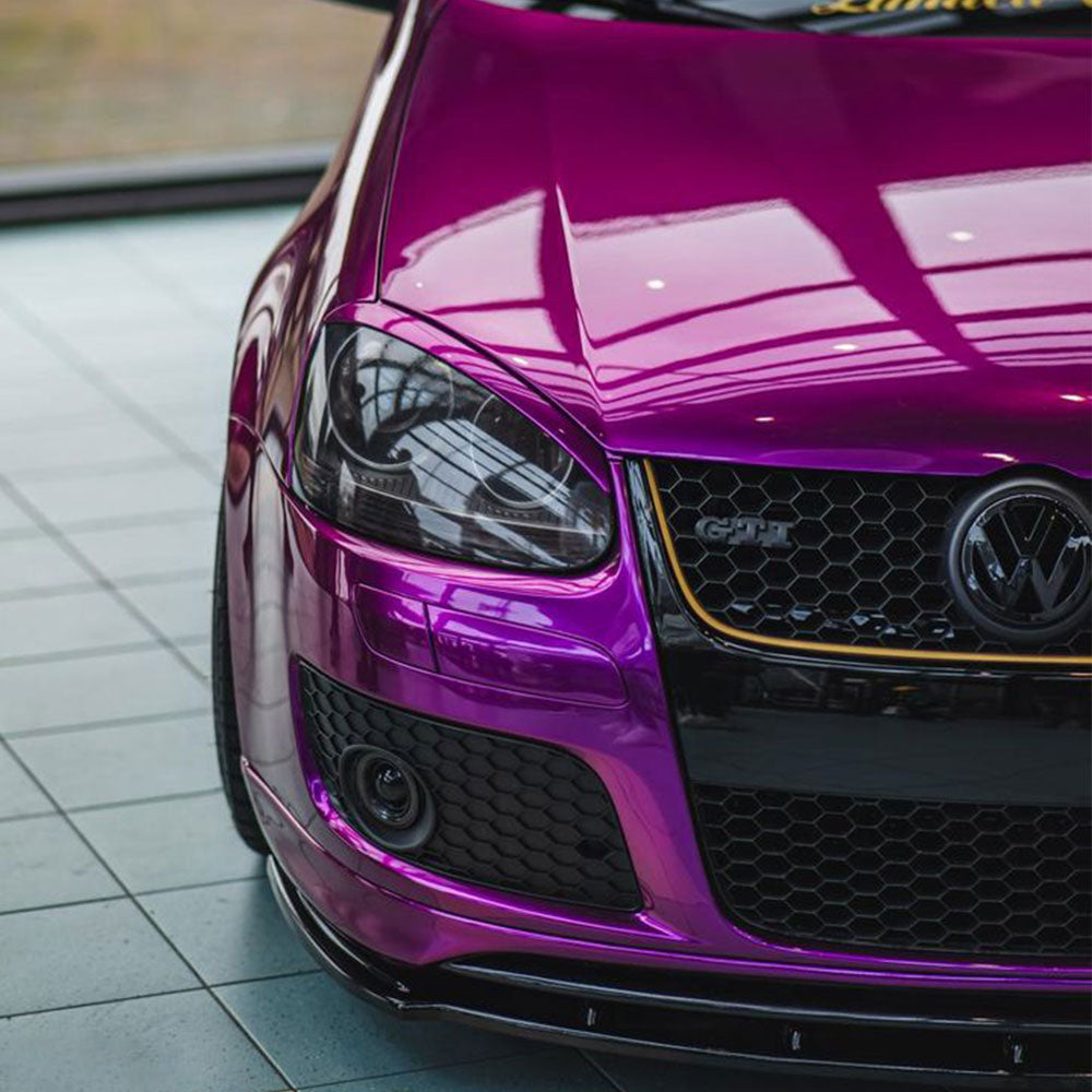Volkswagen GTI wrapped in Glossy Metallic Grape Purple vinyl wrap