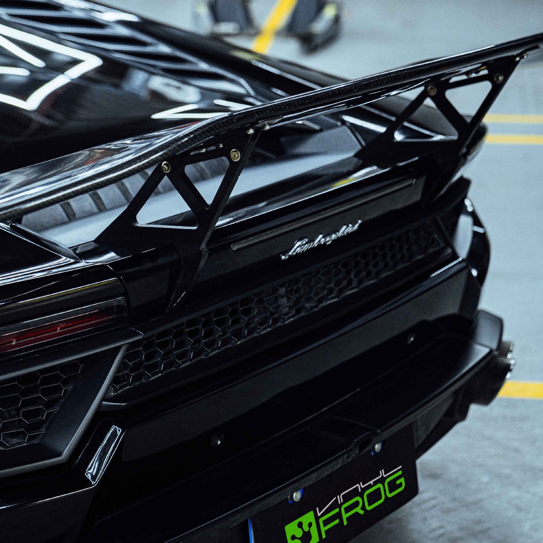 Rear wing view of Lamborghini lossy Metallic Metal Black Vinyl Wrap