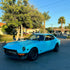 Classic sports car in High Glossy Sky Blue Vinyl Wrap