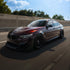 BMW wrapped in Glossy Metallic Plum Purple vinyl wrap on road