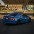 BMW M3 wrapped in High Glossy Laguna Blue vinyl wrap back view.